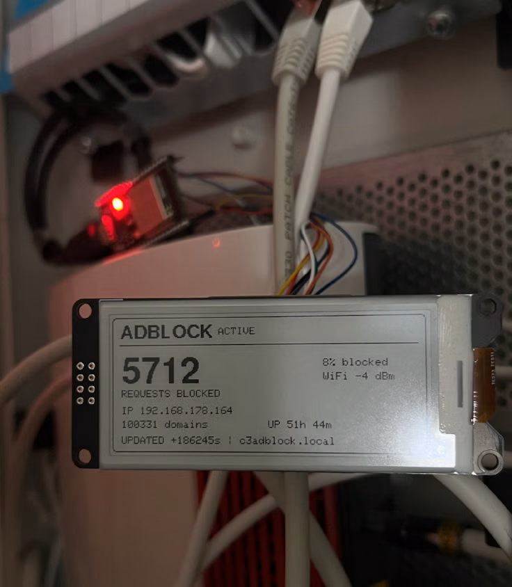 ESP32 Ad Blocker running beside the router