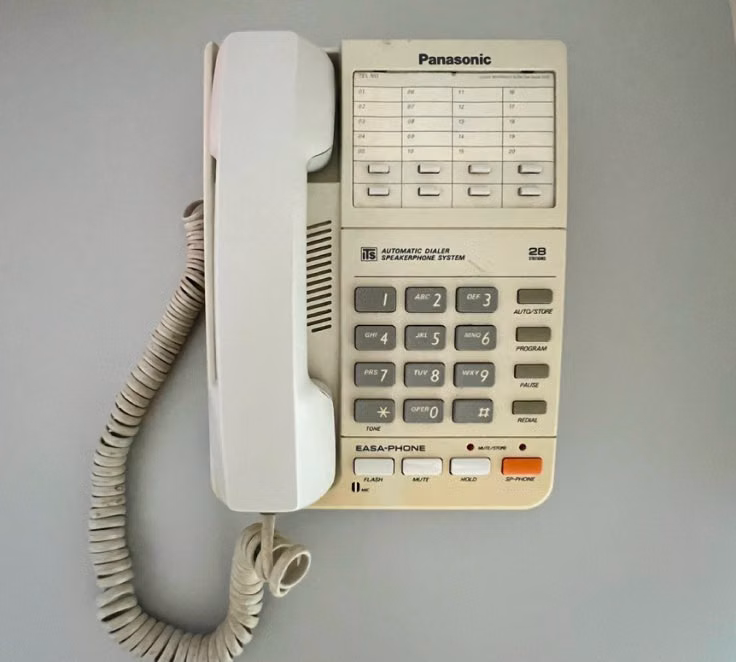 Panasonic KX-T2315 desk phone in yellowed condition before restoration