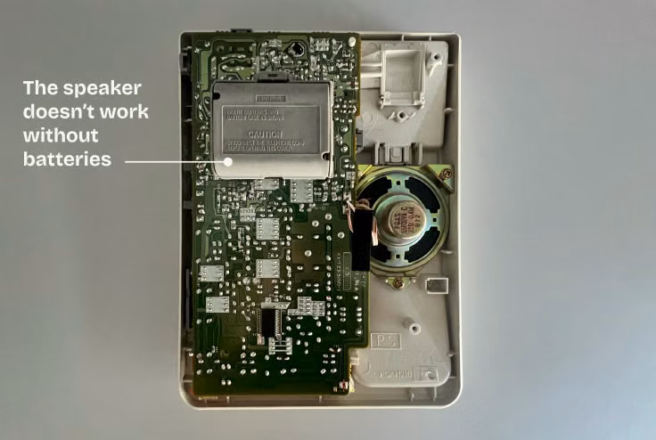 Panasonic phone restoration step showing cleaned plastic components
